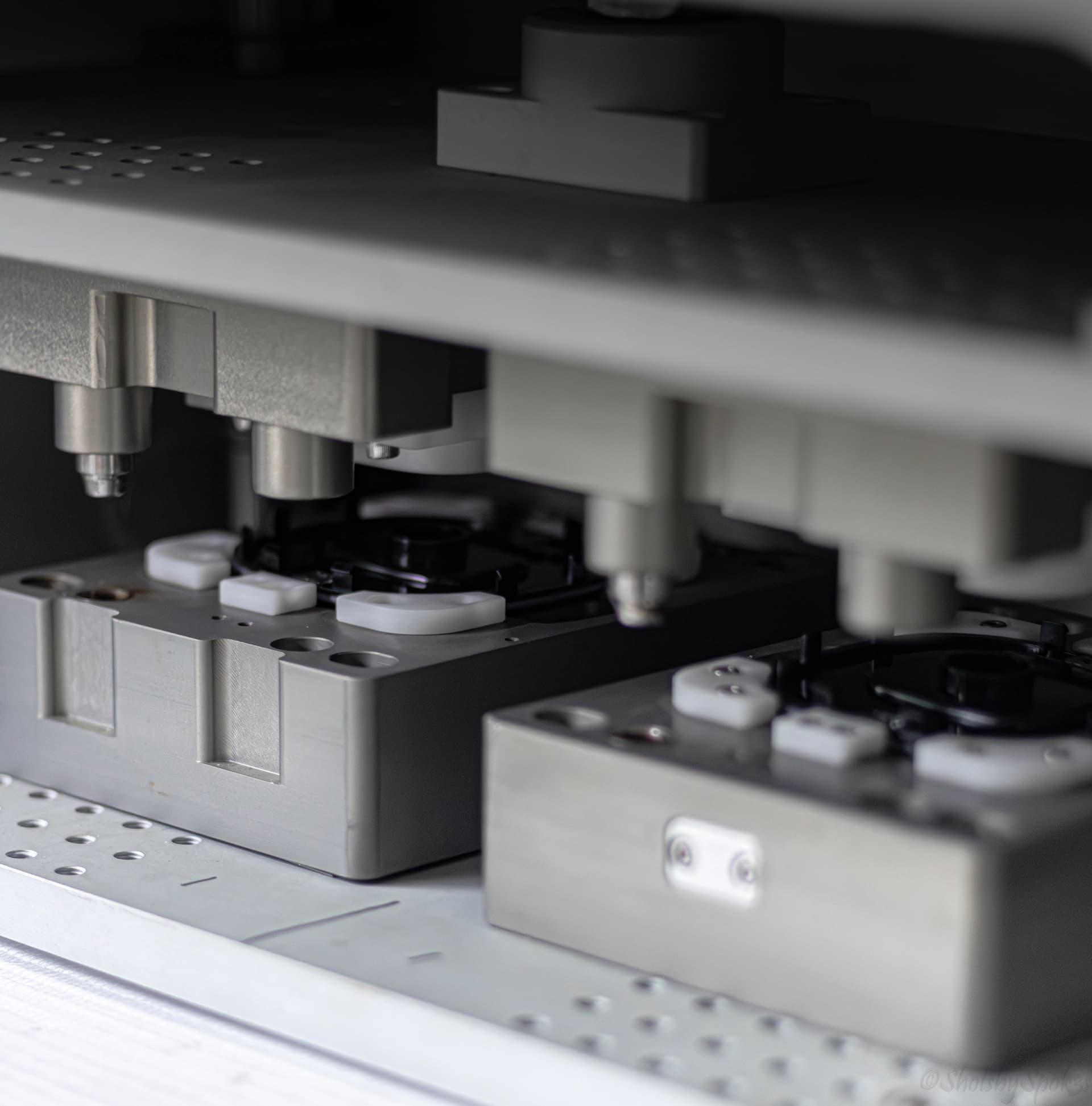 Precision automated testing station with tooling fixtures